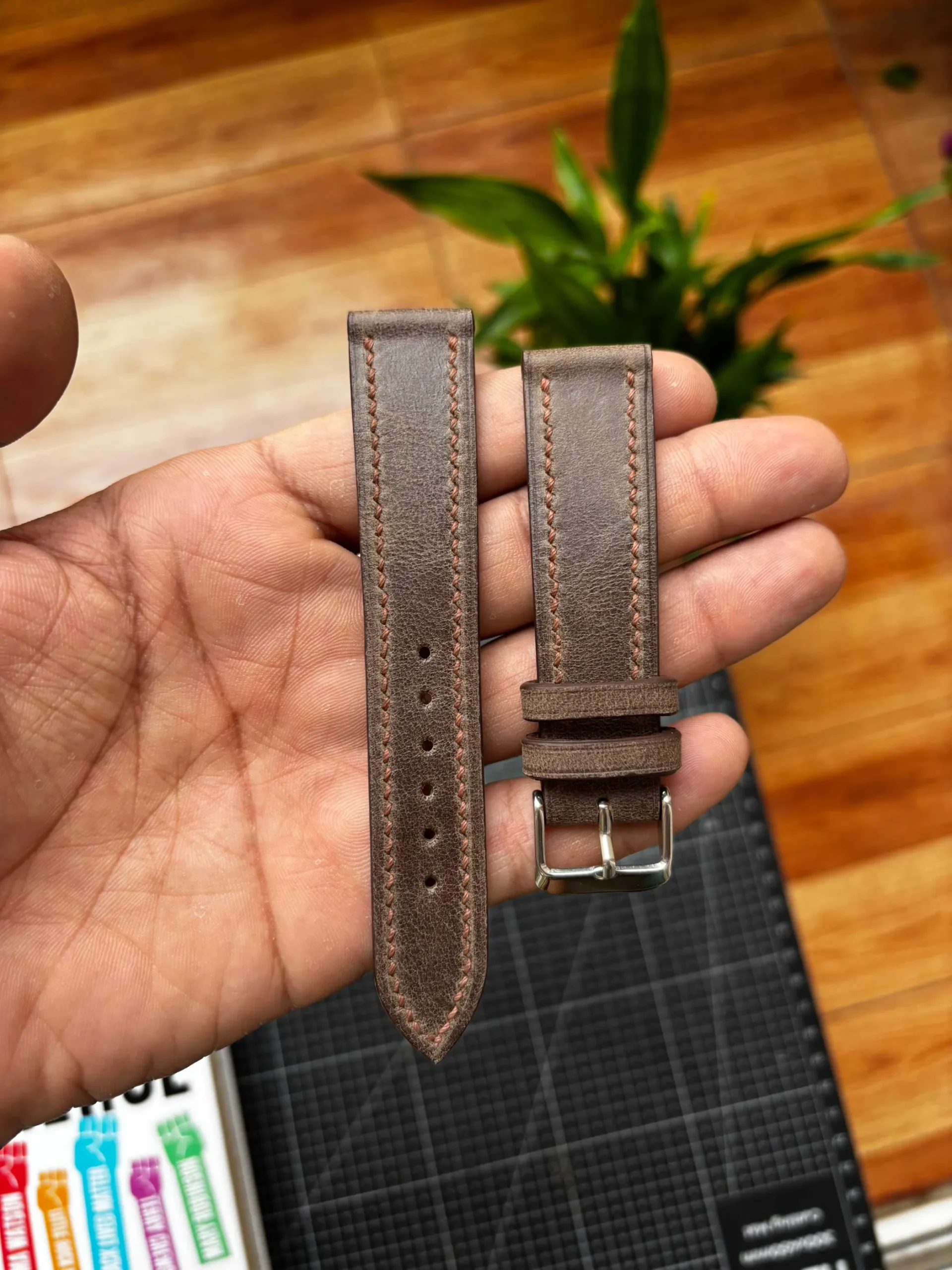 Aniline Vintage Distressed Brown Strap Nakshara buckle worn on wrist
