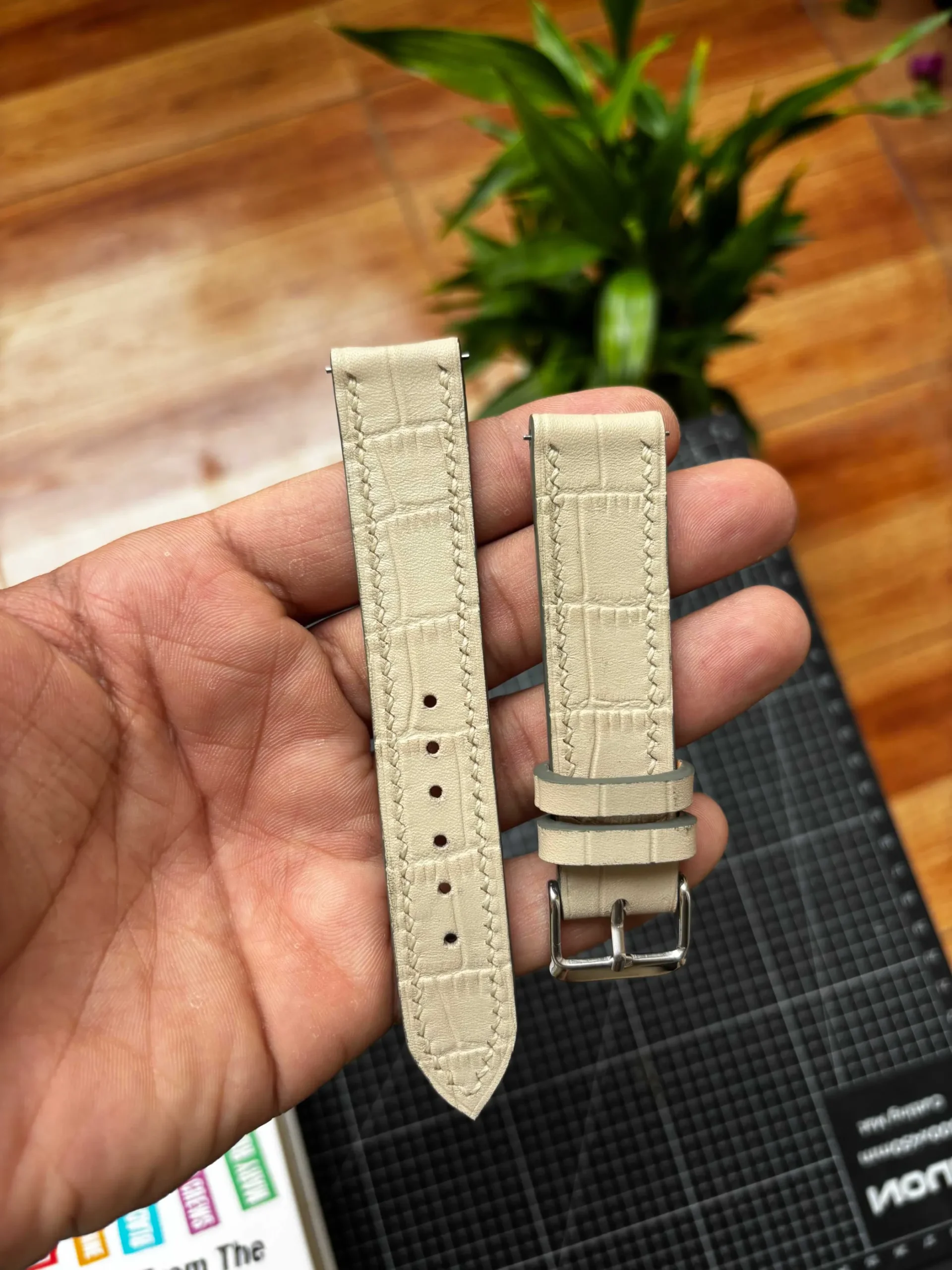 Italian Alligator-Embossed Strap Nakshara buckle worn on wrist