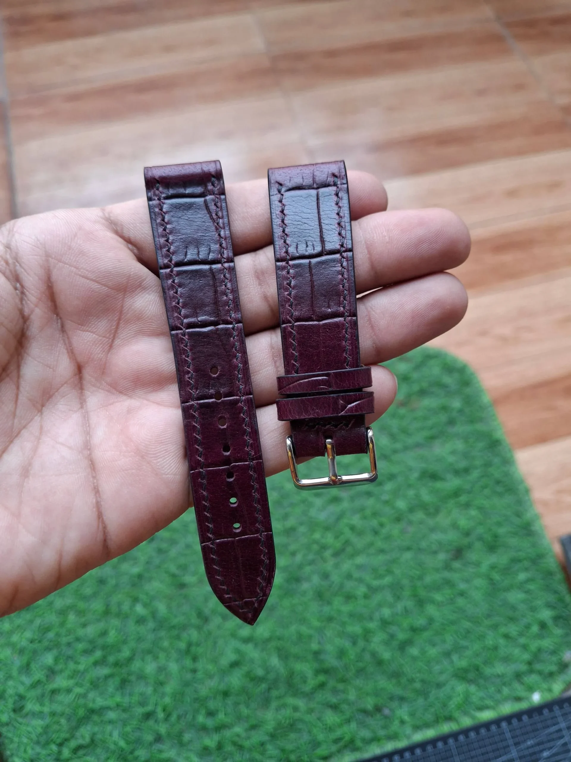 Nakshara buckle worn on wrist