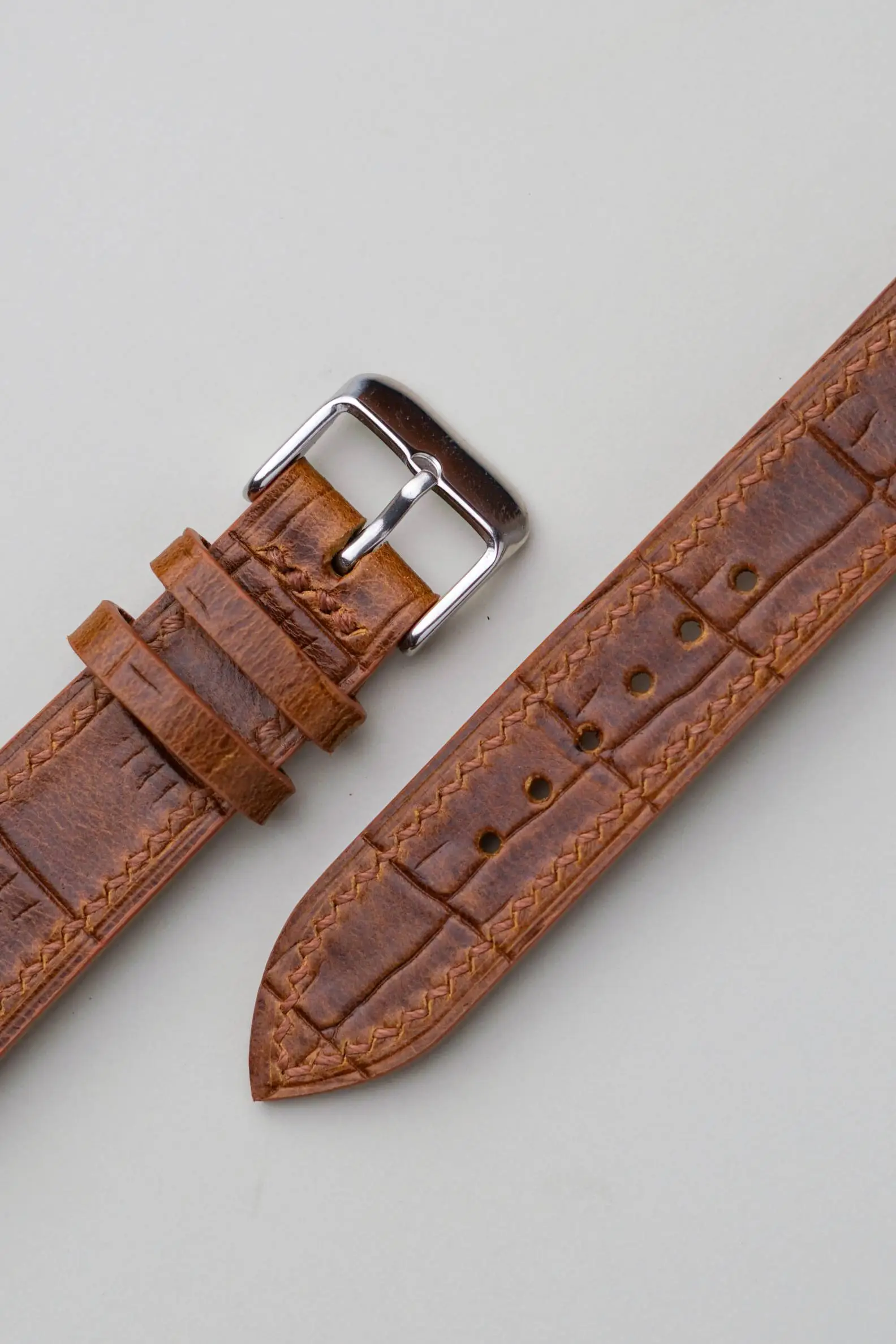 brown croco embossed strap detail brown croco embossed strap detail