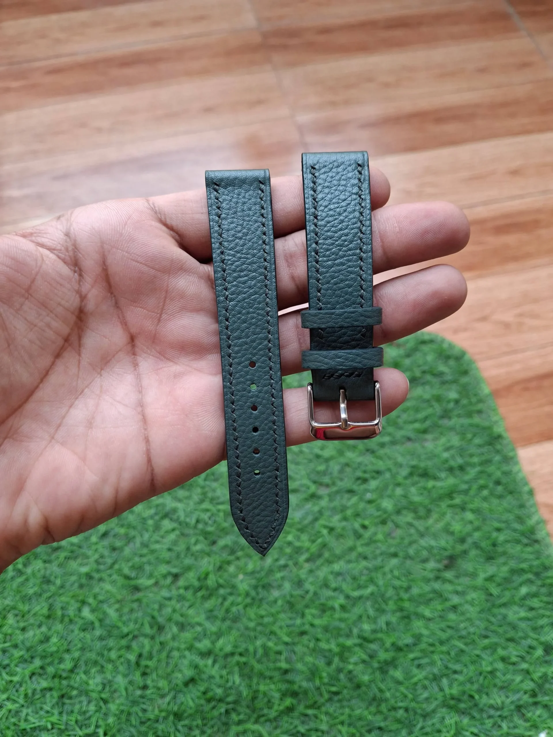 Nakshara buckle worn on wrist